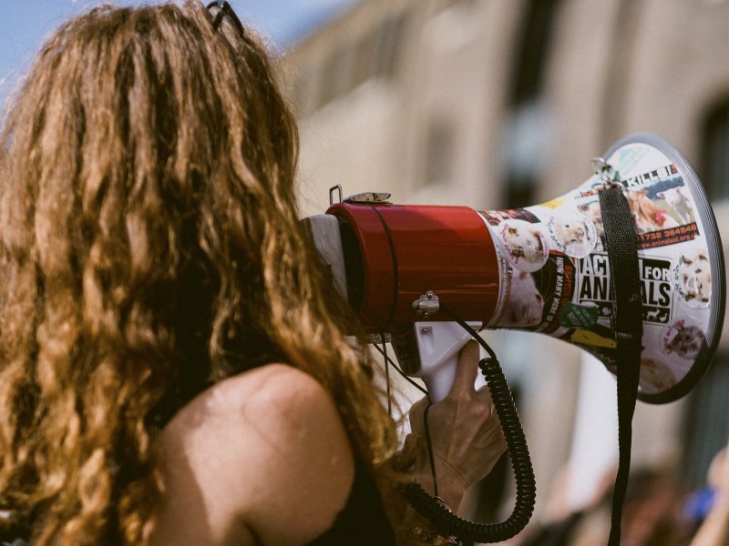 Woman speaking into a megaphone